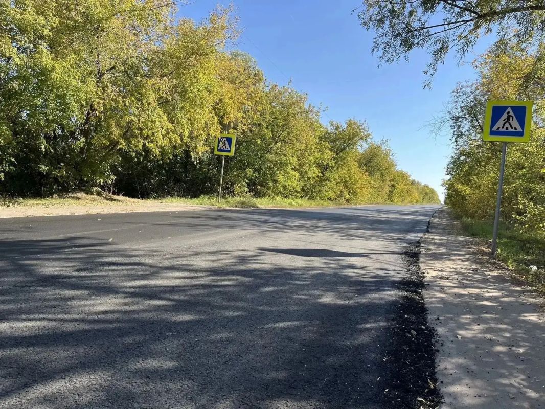 На въезде в микрорайон Крутая Горка уложили новый асфальт На въезде в микрорайон Крутая Горка уложили новый асфальт